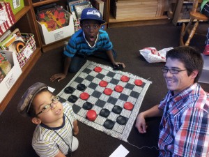 Jumoke & Kahlial playing Checkers with Mr. Ryan!